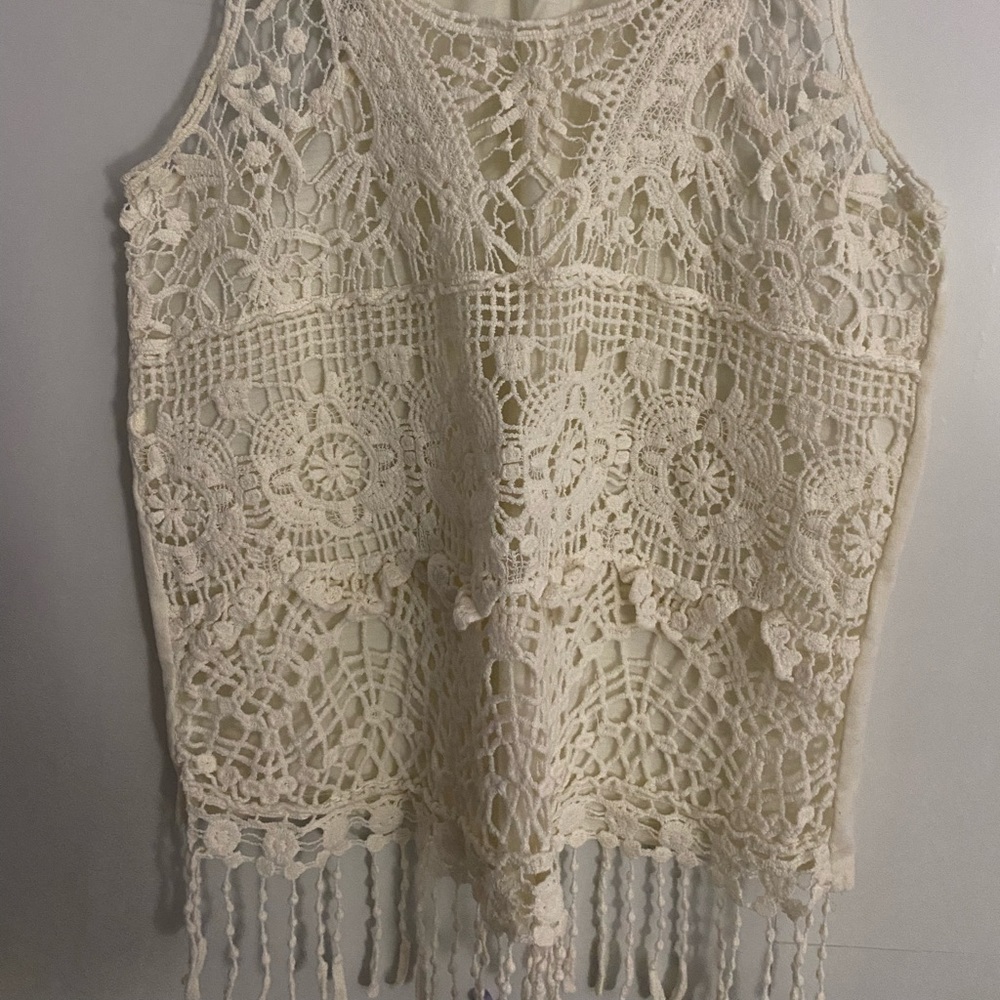 NOBO sleeveless shirt. Laced front and fringe
